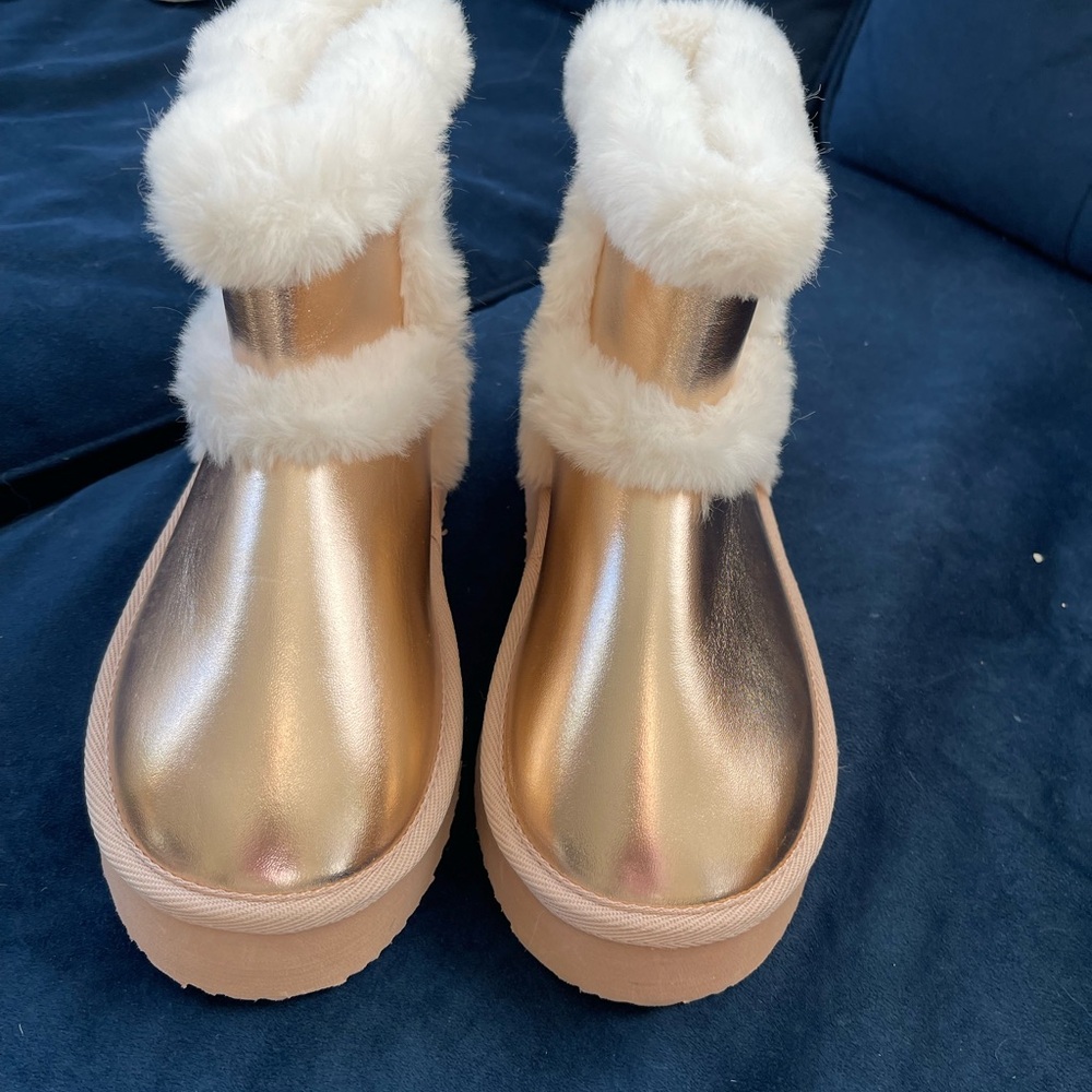 Rose Gold and White Women's Boots with furry inside and out by Juicy Couture.
